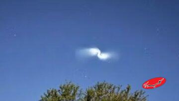 ماجرای نور مارپیچی مرموز در آسمان یک کشور خبرساز شد/ عکس