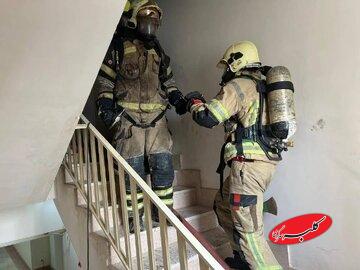 ببینید | آتشسوزی یک ساختمان در دهکده المپیک