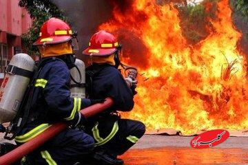 آتشسوزی یک ساختمان چهار طبقه مسکونی در خیابان ولیعصر/ آمار مصدومان