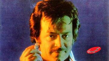 ایرج قادری در دفترش کارش در دهه ۷۰/ عکس